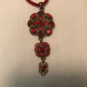 Pendant on leather